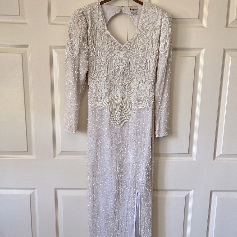 Beautiful vintage 100% silk fully beaded evening gown.